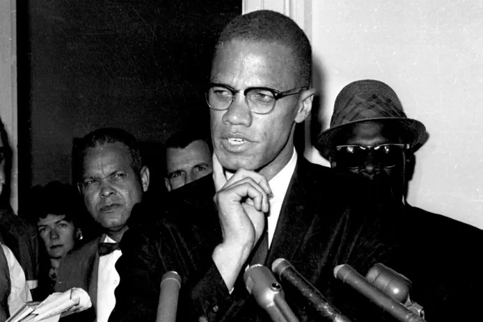 American civil rights activist Malcolm X was shot and killed during a speech in New York on February 21, 1965.
