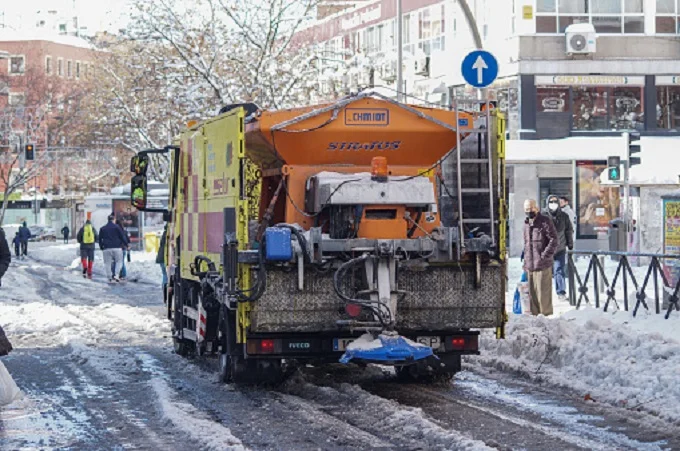Why are roads sprinkled with salt in winter?