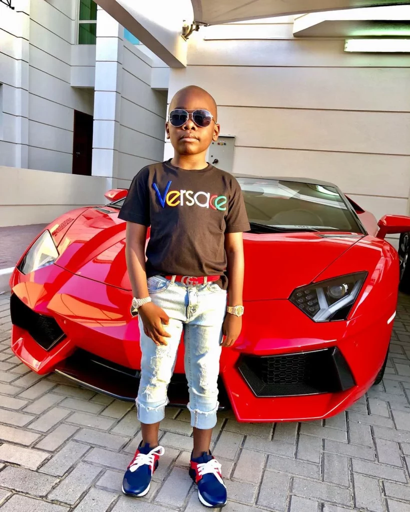 Mompha Junior with his new car.