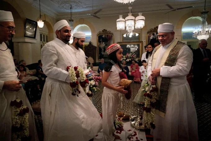 What traditions do Zoroastrians observe and which ones were they forced to abandon?