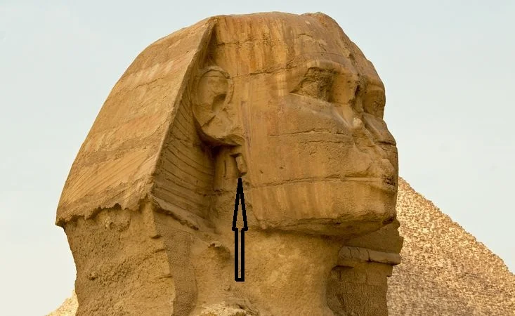 The existence of a small hole in the neck of the sphinx