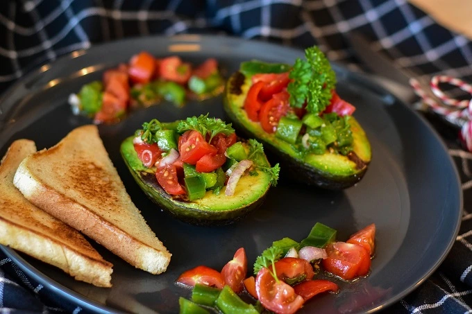 Toast with avocado, red fish and curd cheese