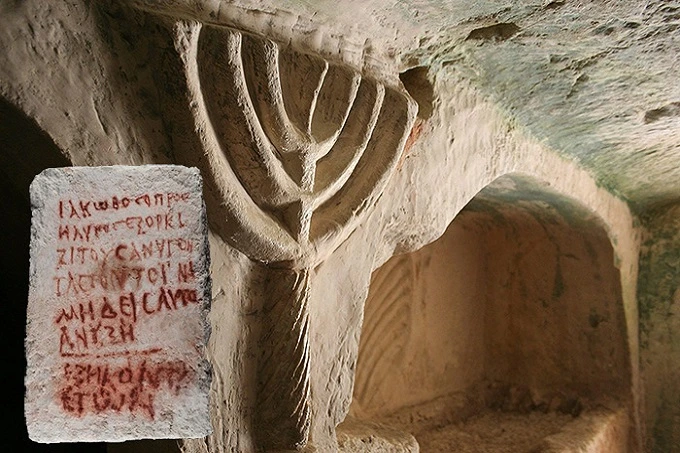 What dark secret does the 1,800-year-old necropolis of Beit She'arim hold and why is it cursed?
