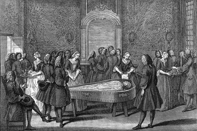 Who are the Sin-Eaters, and how did eating at funerals become a tradition?