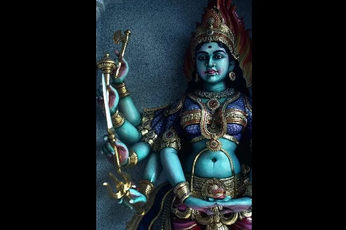 Why do the gods of India have blue and white skin?