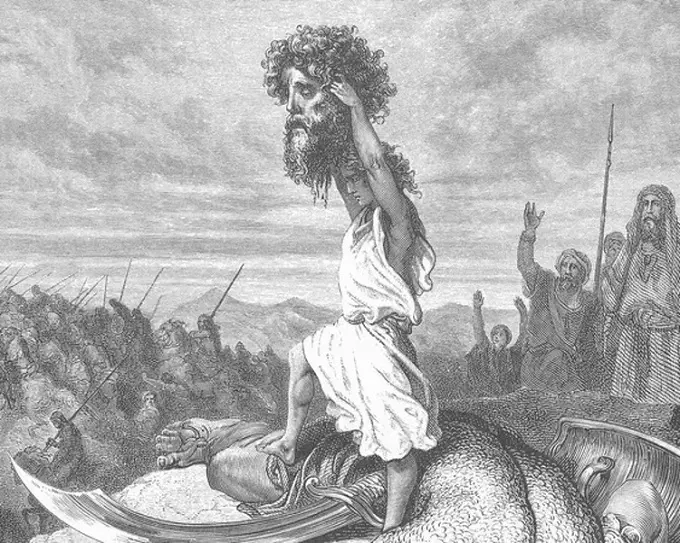 David with Goliath's head raised high